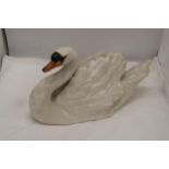 A LARGE CERAMIC SWAN