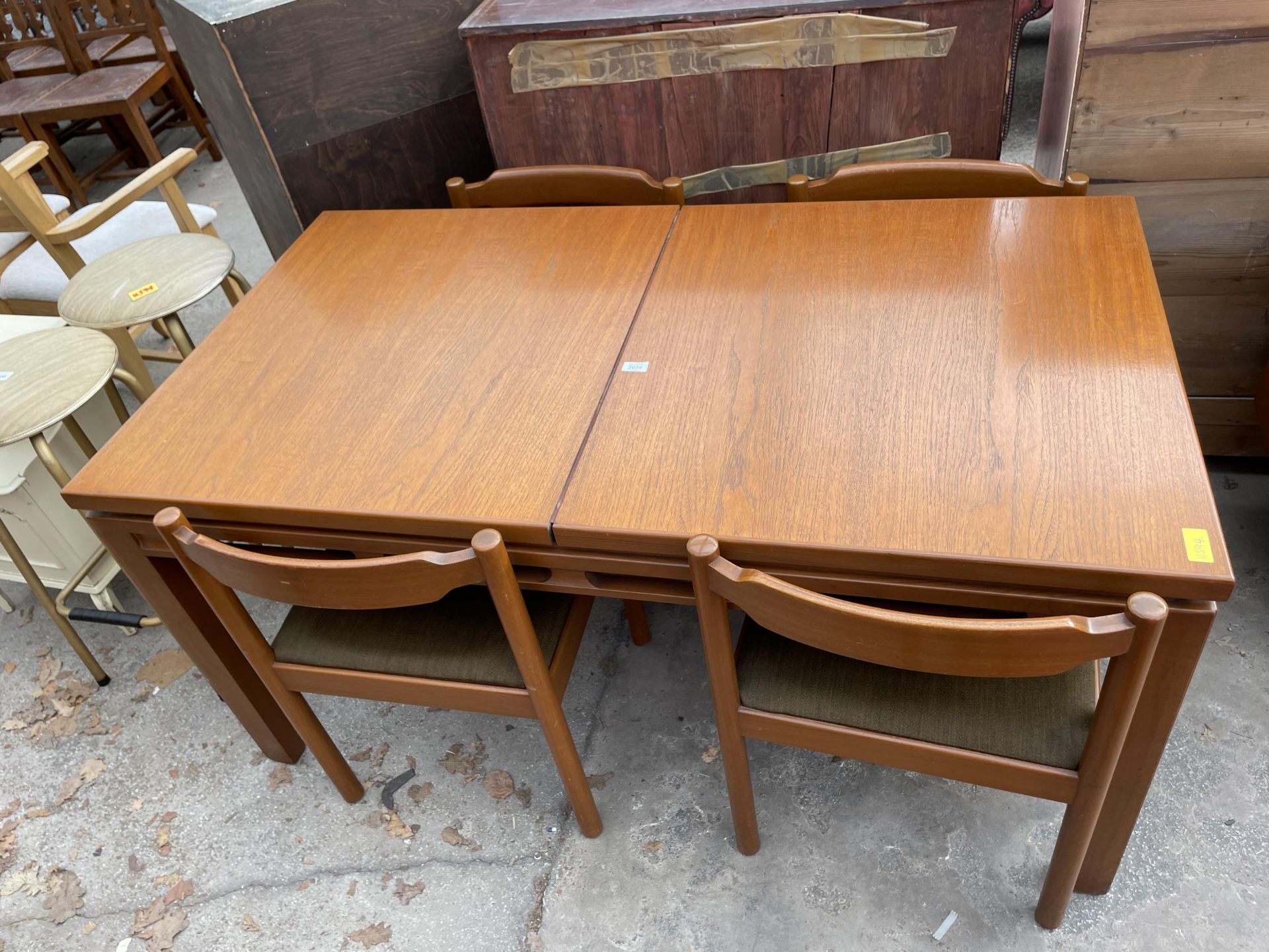 A RETRO TEAK EXTENDING DINING TABLE 60" X 33" (LEAF 18") AND FOUR DINING CHAIRS