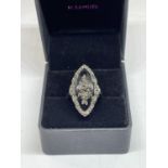 A LADIES DRESS RING IN A PRESENTATION BOX