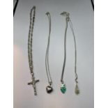 FOUR SILVER NECKLACES WITH PENDANTS