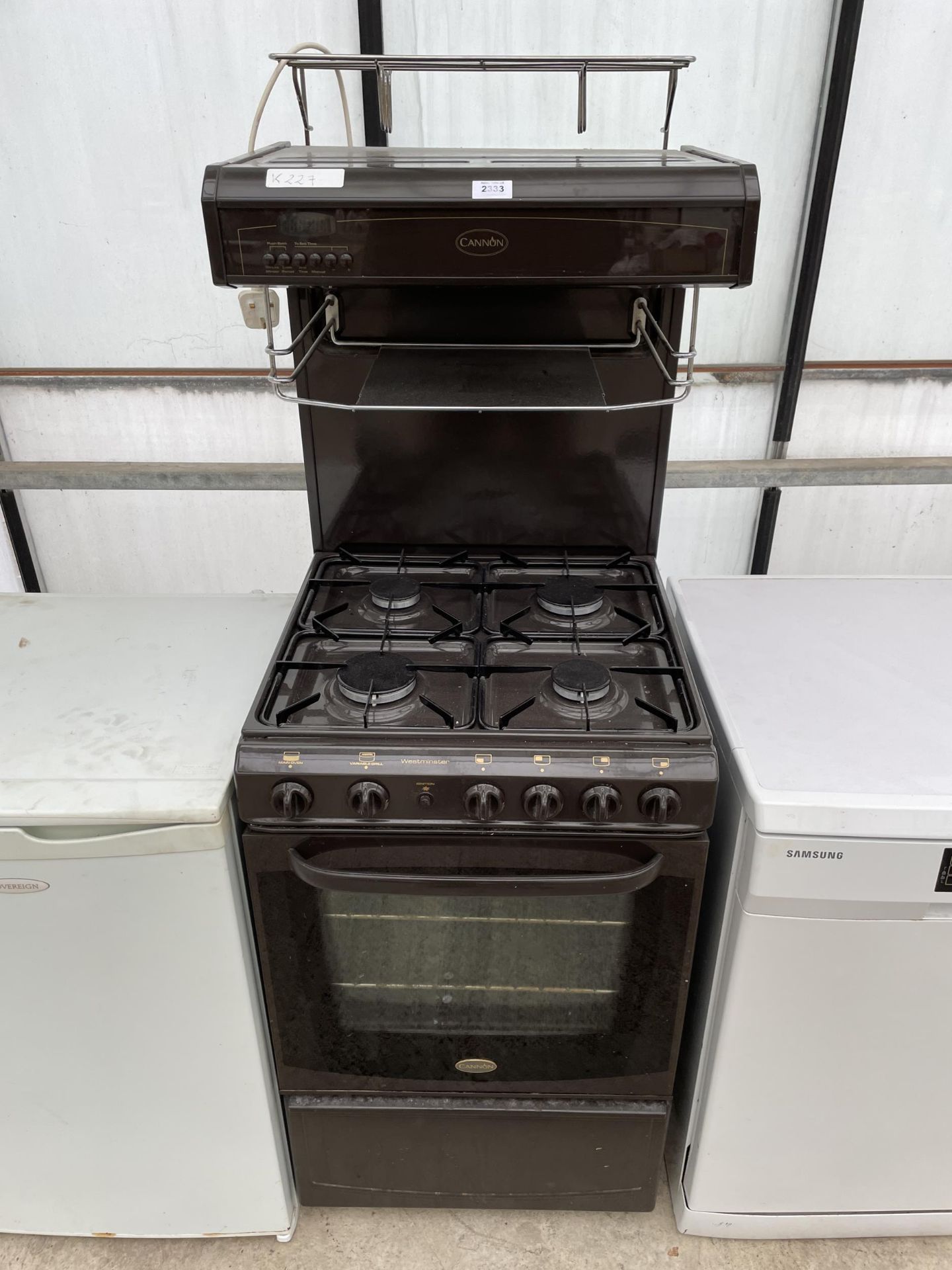 A BLACK CANON FREESTANDING OVEN AND HOB