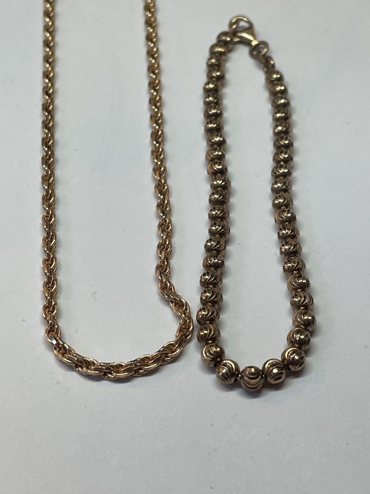 THREE SILVER GILT NECKLACES AND A BRACELET - Image 3 of 3