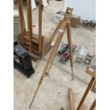 A WOODEN FOLDING ARTISTS EASEL