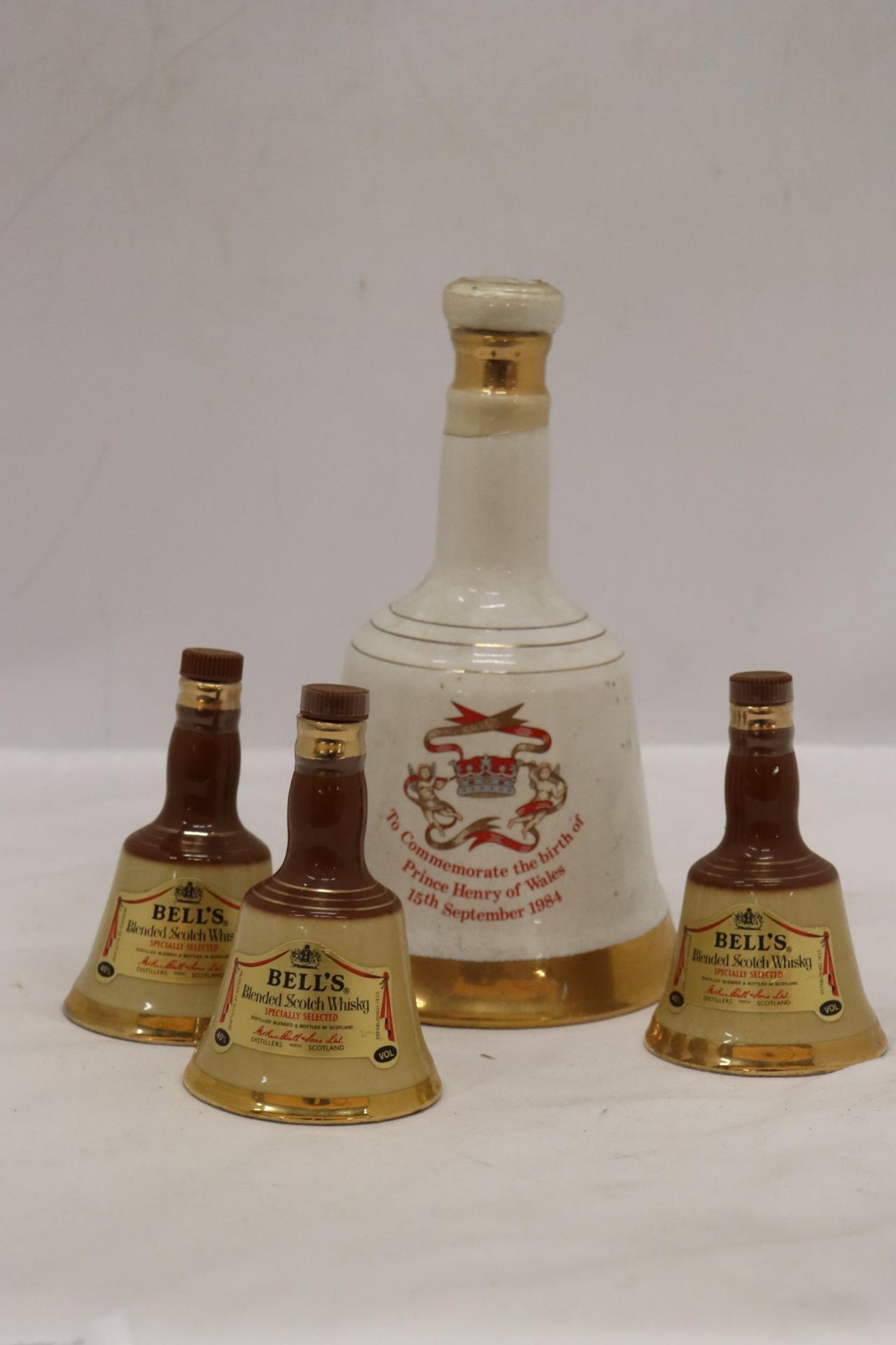 ONE LARGE AND THREE SMALL, BELL'S WHISKY CERAMIC DECANTERS - Image 2 of 4
