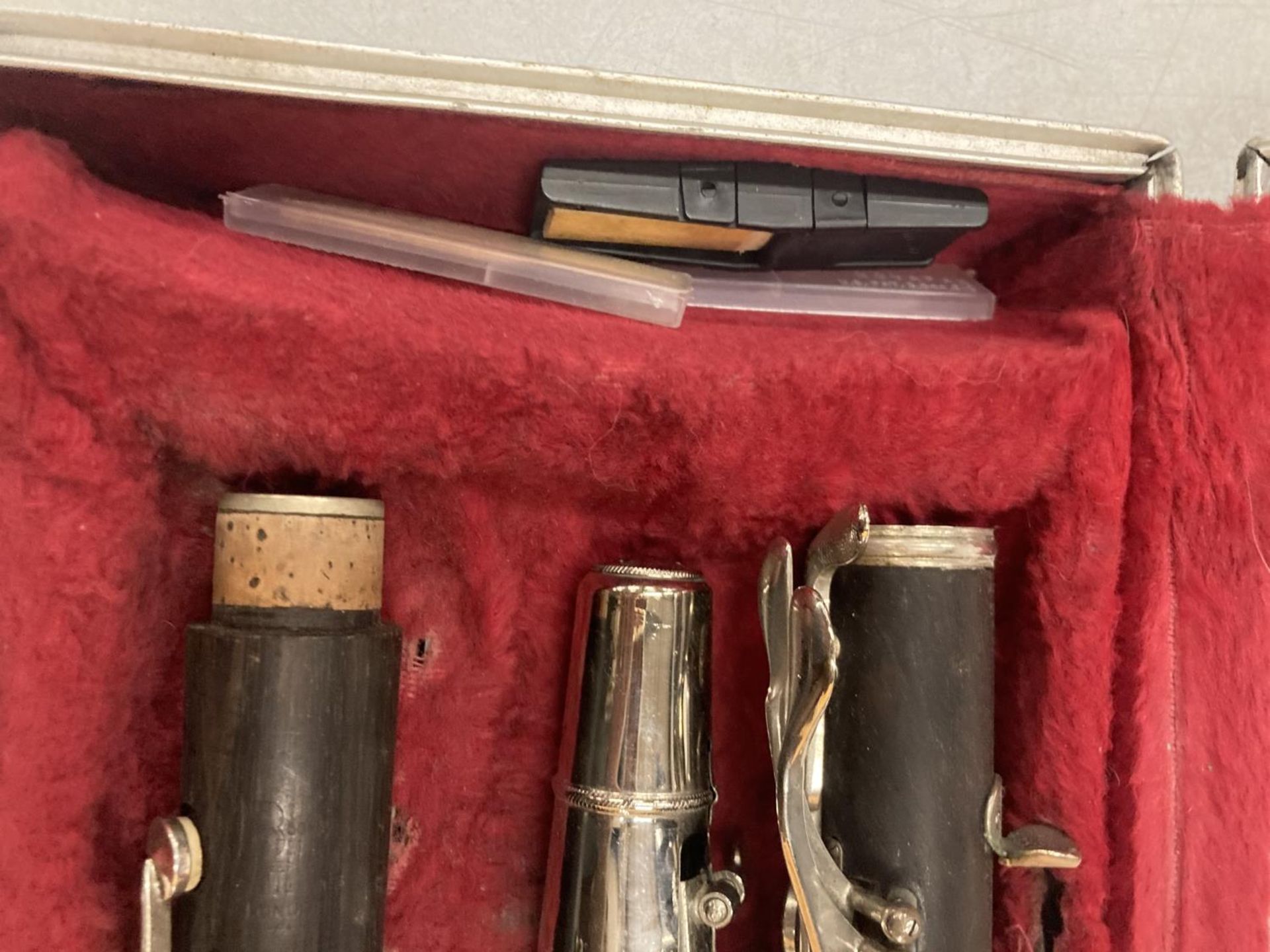 A BOOSEY AND HAWKES EBONISED CLARINET IN A CASE - Image 4 of 5