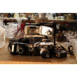 A QUANTITY OF VINTAGE CAMERAS TO INCLUDE YASHICA ZOOMTEC, YASHICA EE, HP, ETC.,