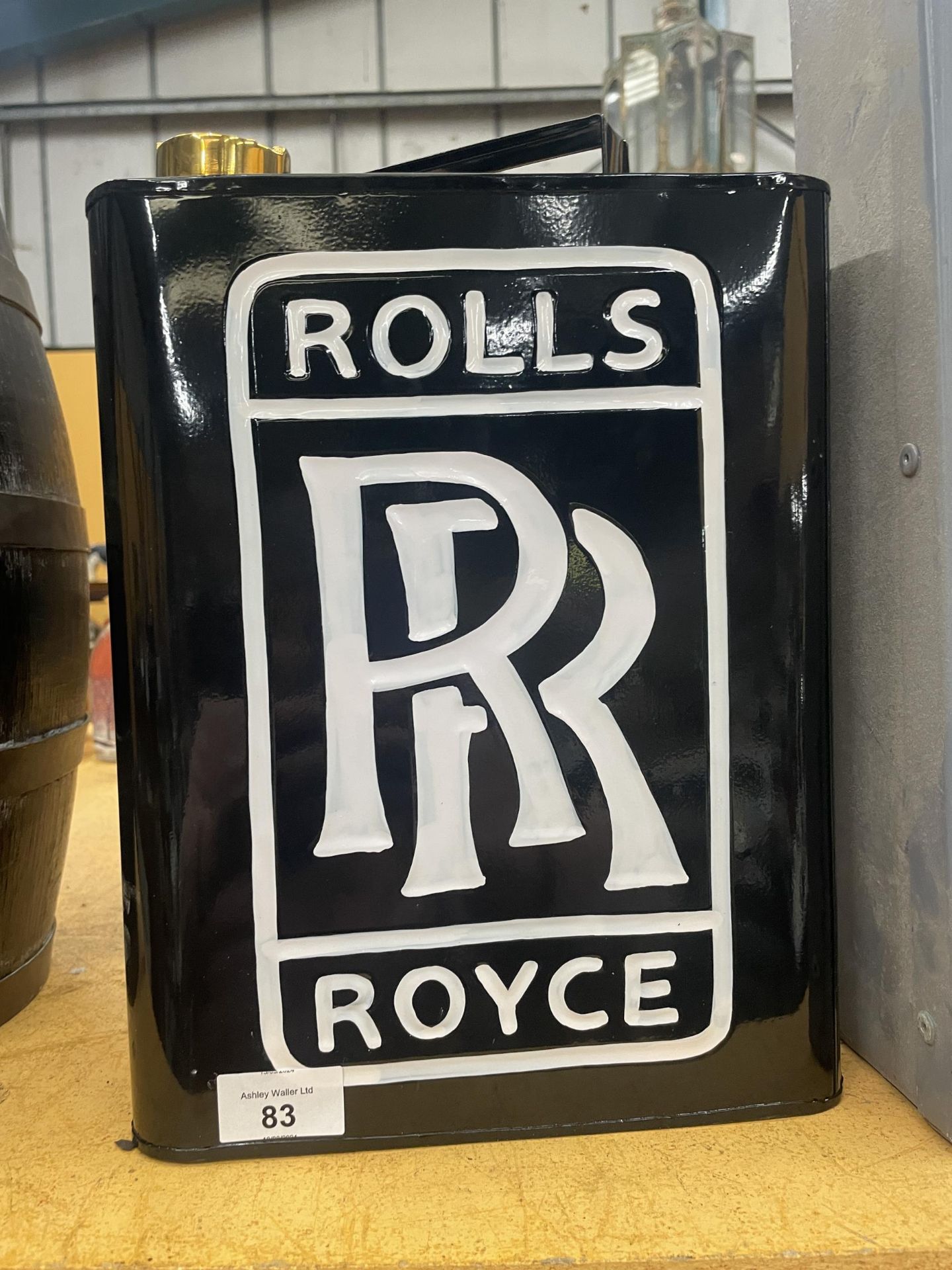 A BLACK ROLLS ROYCE PETROL CAN WITH BRASS STOPPER