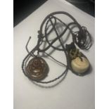 TWO NECKLACES TO INCLUDE A CARVED BUDDHA PENDANT AND A TALISMAN GOOD LUCK AMULET BOTH ON A LEATHER