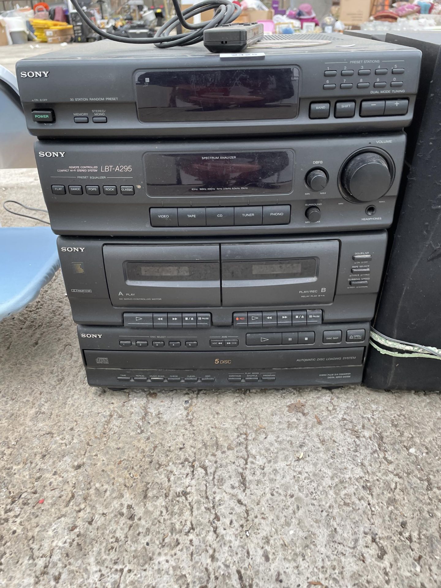 A SONY STEREO SYSTEM WITH A PAIR OF SPEAKERS