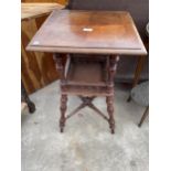 A VICTORIAN MAHOGANY TWO TIER CENTRE TABLE WITH GALLERIED TIER, TURNED UPRIGHTS, LEGS AND