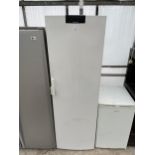 A WHITE SIEMENS UPRIGHT FREEZER