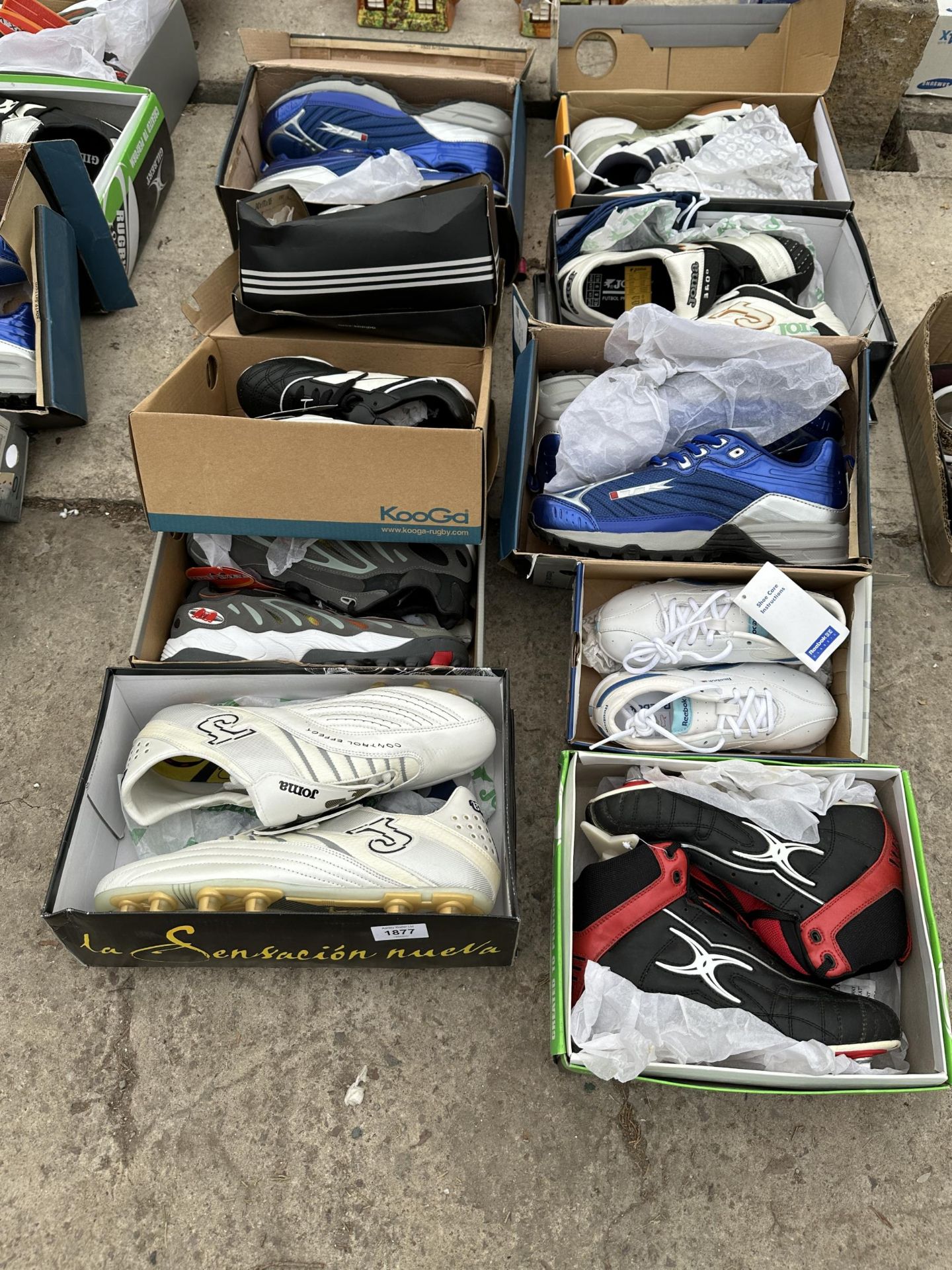 TEN PAIRS OF AS NEW AND BOXED SPORTS BOOTS AND TRAINERS