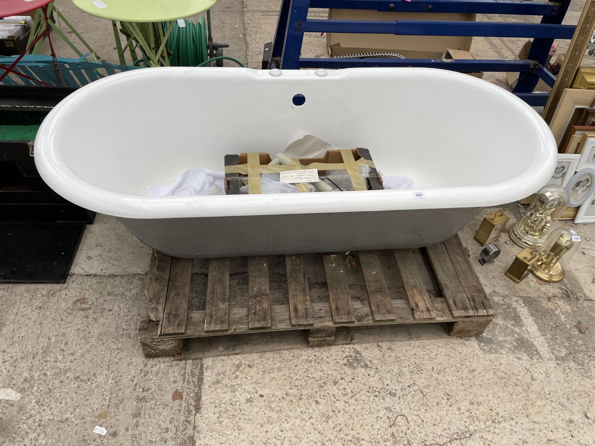 A FIRED EARTH "CANTERBURY" METAL FREESTANDING BATH WITH FOUR FEET AND WASTE FITTINGS (RETAIL £