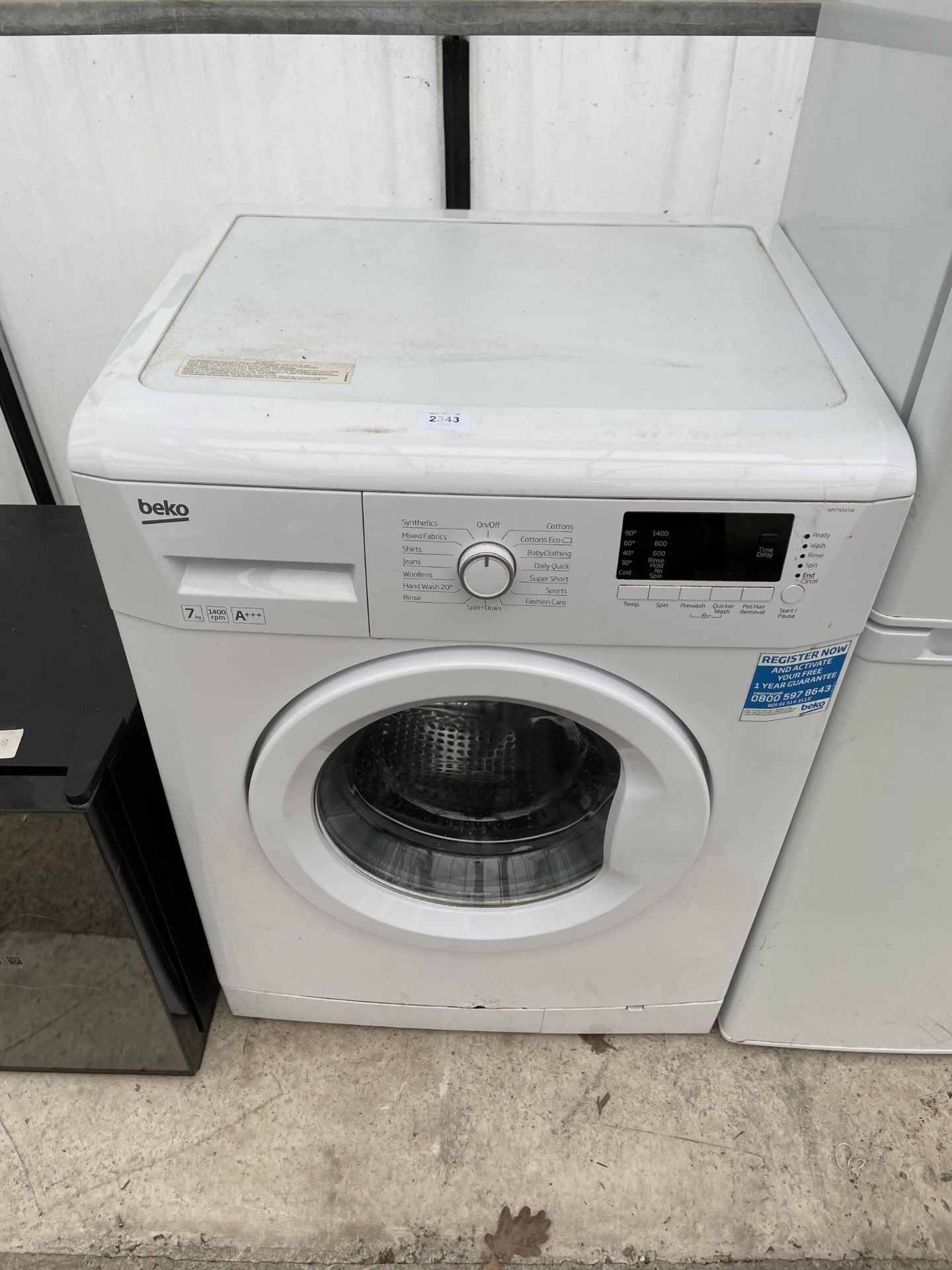 A WHITE BEKO 7KG WASHING MACHINE