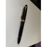 A MONT BLANC MEISTERSTUCK GOLD COATED LE GRAND FOUNTAIN PEN WITH 18 CARAT GOLD MEDIUM NIB