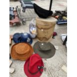 AN ASSORTMENT OF HATS AND A HAT BOX