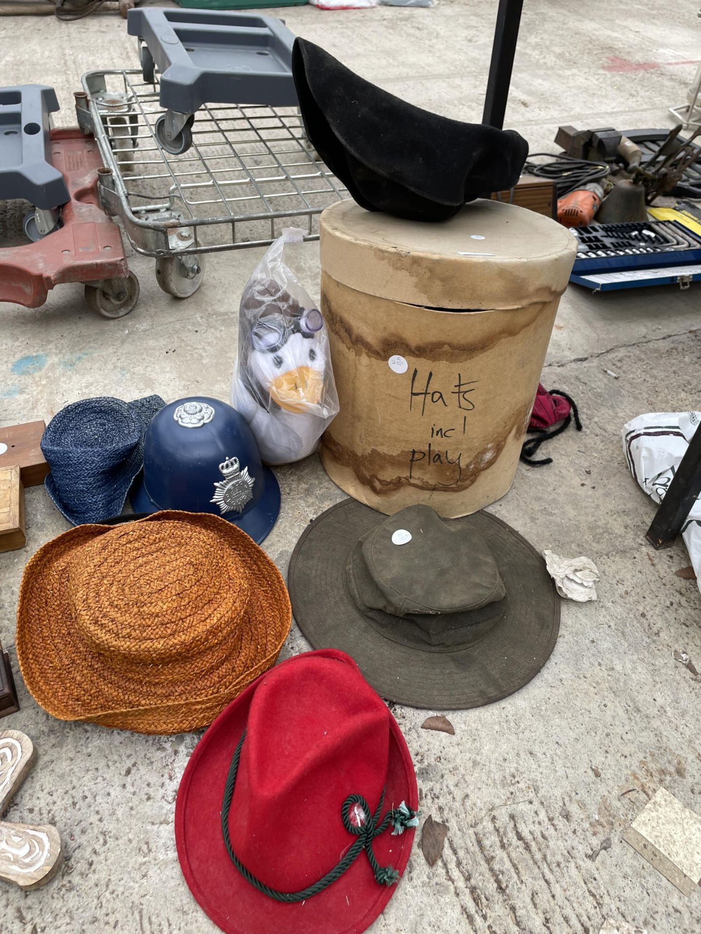 AN ASSORTMENT OF HATS AND A HAT BOX