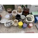 AN ASSORTMENT OF CERAMIC JUGS AND PLANT POTS ETC