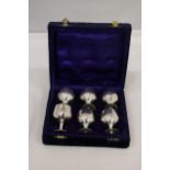 A SET OF SIX SILVER PLATED GOBLETS IN A VELVET LINED BOX