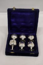A SET OF SIX SILVER PLATED GOBLETS IN A VELVET LINED BOX