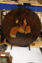 AN AERT DECO CIRCUALR FIRE SCREEN WITH EMBOSSED WOODEN LADIES IN FULL DRESSES AND BONNETS