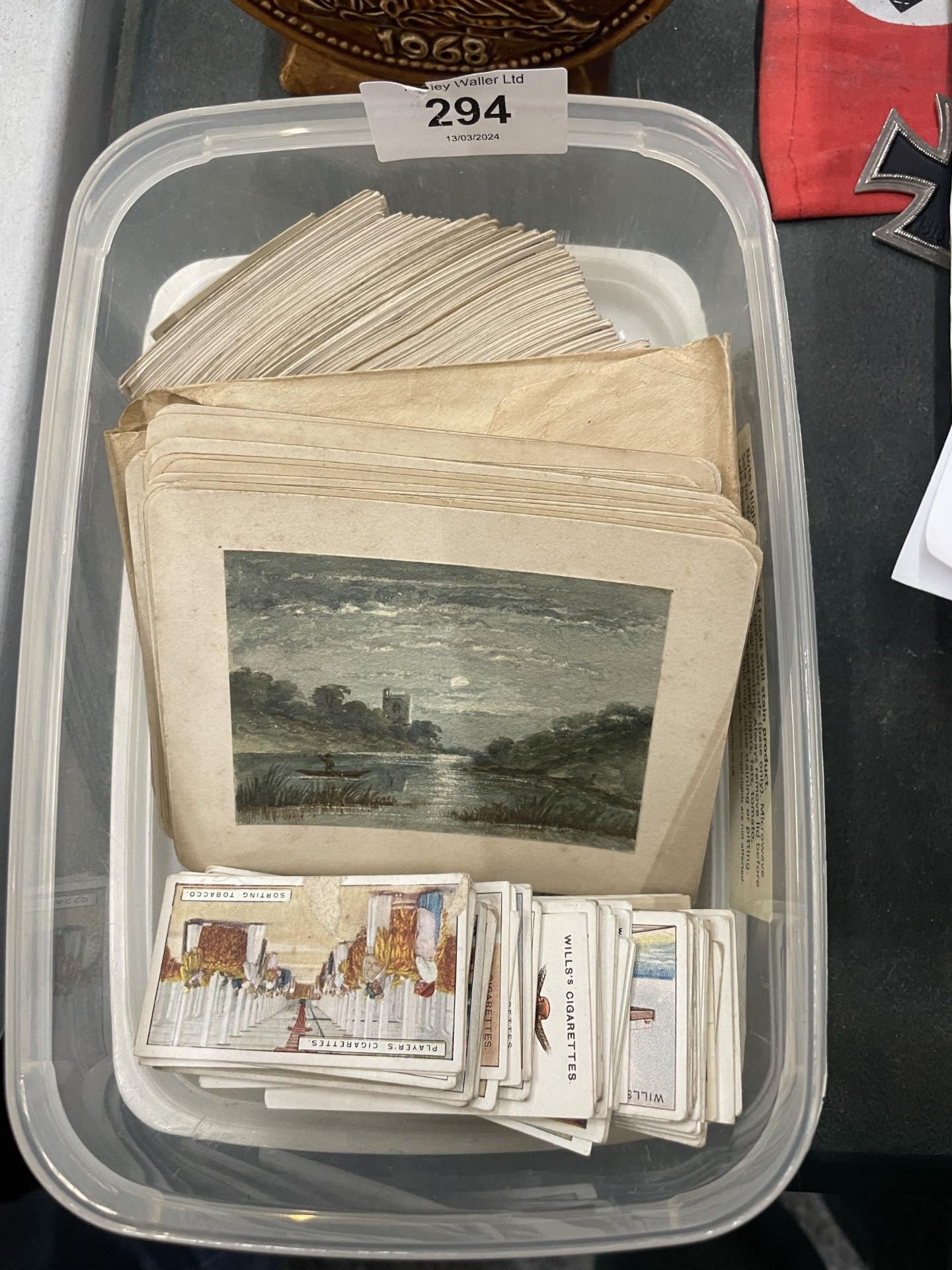 A COLLECTION OF CIGARETTE CARDS AND SMALL WATERCOLOURS