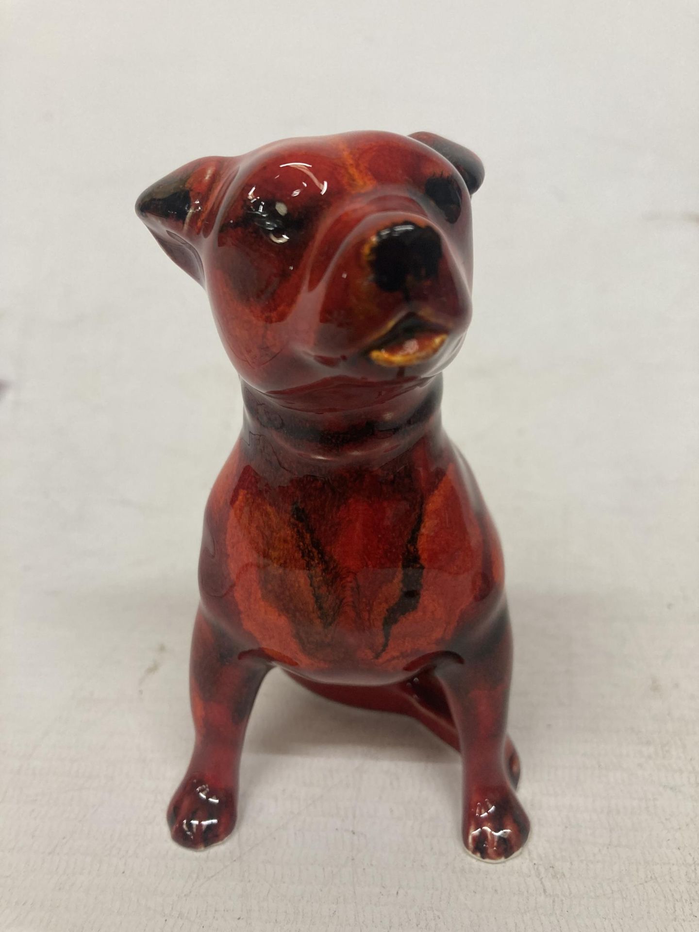 AN ANITA HARRIS STAFFY DOG SIGNED IN GOLD