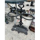 A REPRODUCTION CAST IRON BROLLY/STICK STAND WITH DRIP TRAY