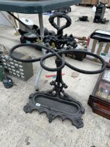 A REPRODUCTION CAST IRON BROLLY/STICK STAND WITH DRIP TRAY