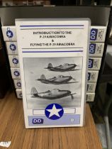 A COLLECTION OF VHS VIDEO TAPES ABOUT FLYING VINTAGE PLANES, MUSTANG, FLYING FORTRESS, ETC - 7 IN