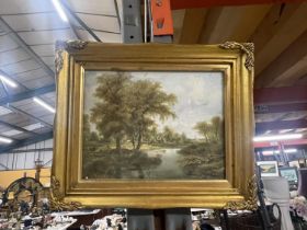 A SMALL GILT FRAMED PRINT OF A RURAL SCENE, 30CM X 25CM