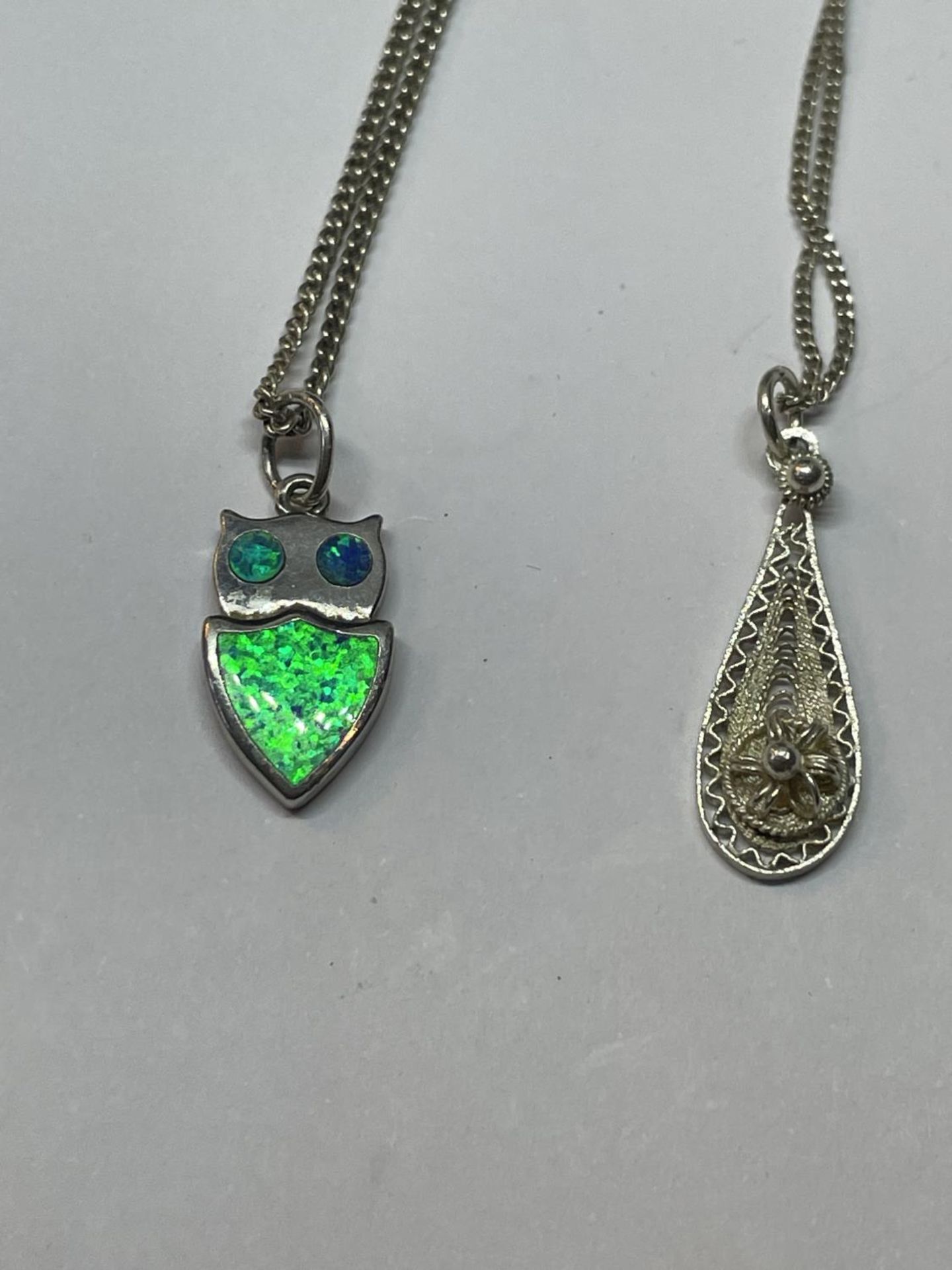 FOUR SILVER NECKLACES WITH PENDANTS - Image 3 of 3