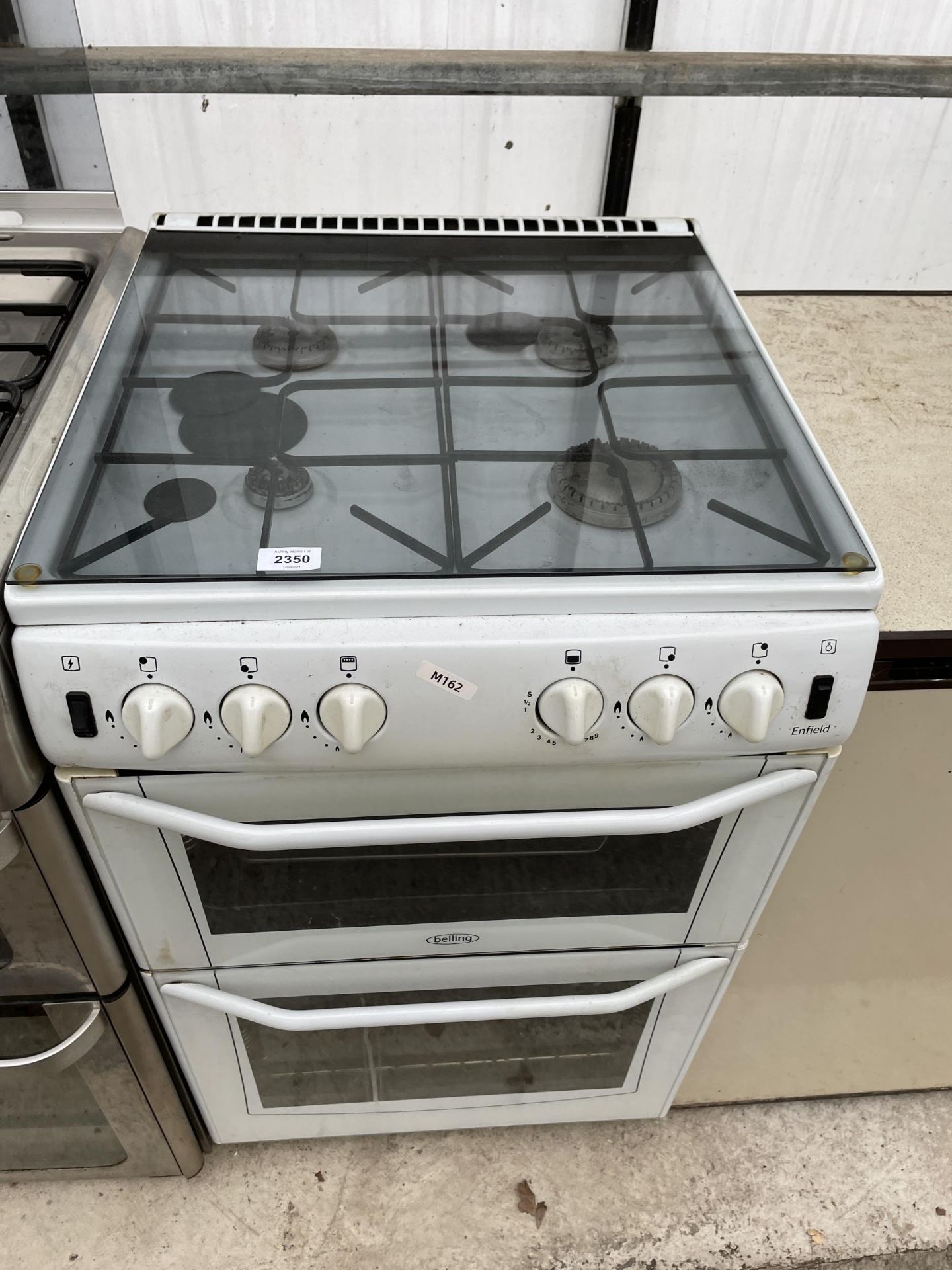 A WHITE BELLING GAS AND ELECTRIC OVEN AND HOB