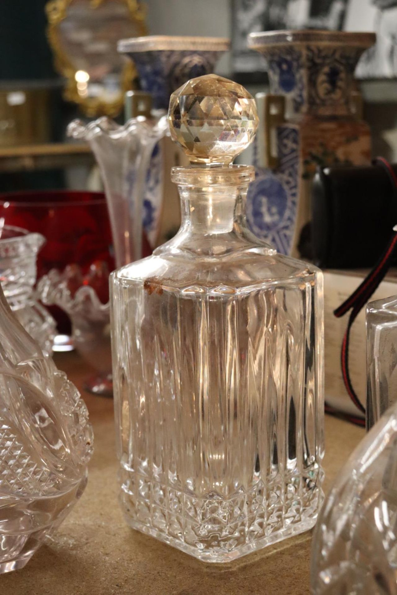 FOUR CUT GLASS DECANTERS ONE WITH A WHISKEY DECANTER LABEL - Image 4 of 4