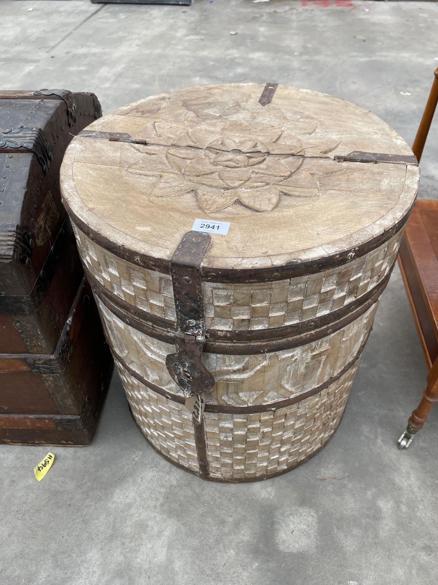 AN INDIAN HARDWOOD GRAIN/RICE DRUM CONTAINER WITH HINGED LID AND METALWARE FITTINGS DIAMETER 18"