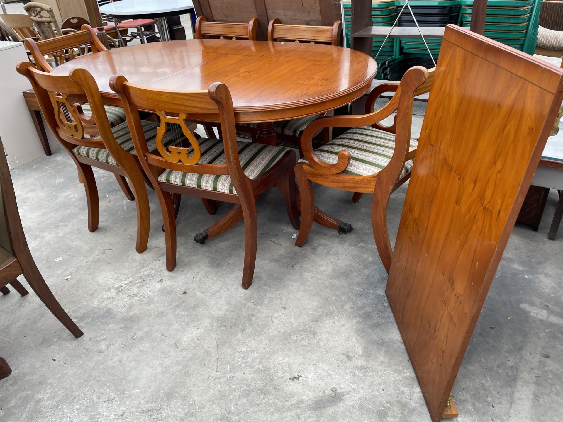 A YEW WOOD EXTENDING DINING TABLE 62" X 39" (LEAF 21.5") AND SIX LYRE BACK DINING CHAIRS ONE BEING A - Image 6 of 12