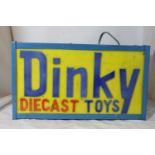 AN ILLUMINATED DINKY DIECAST TOY'S SIGN - 41 X 23 CM