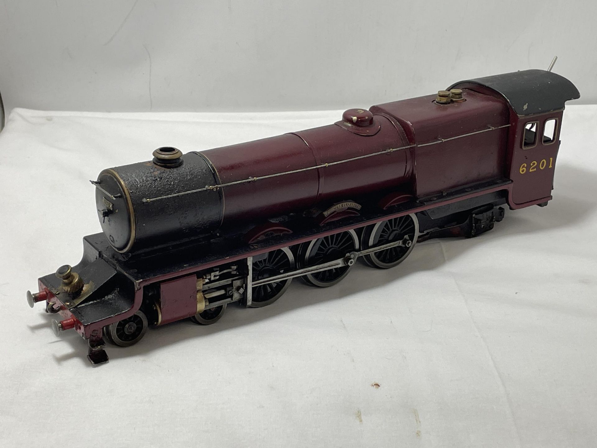 A SCRATCH BUILT LIVE STEAM 30 MM GAUGE 4-6-2 MODEL RAILWAY LOCOMOTIVE NUMBER 6201 IN MAROON AND