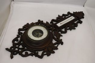A CARVED WOODEN 19TH CENTURY FRENCH BAROMETER