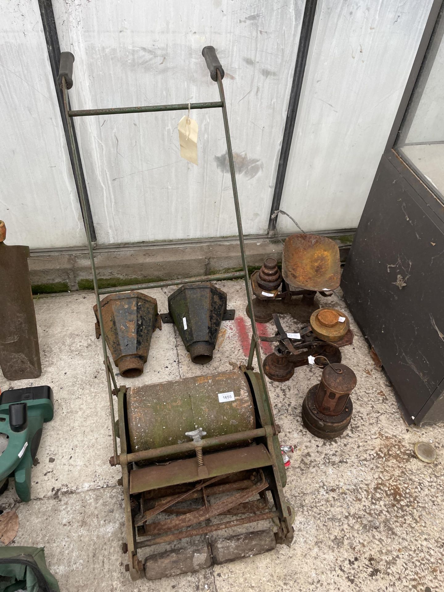 AN ASSORTMENT OF VINTAGE ITEMS TO INCLUDE SCALES, GUTTER HOPPERS AND A LAWN MOWER ETC