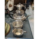 A FOUR PIECE SILVER PLATED TEASET TO INCLUDE A COFFEE POT, TEAPOT, SUGAR BOWL AND CREAM JUG