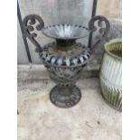 A DECORATIVE METAL PLANTER/ARTIFICIAL FLOWER VASE