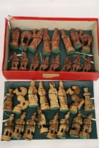 A HAND CARVED WOODEN CHESS SET FROM TAMIL SOUTH INDIA