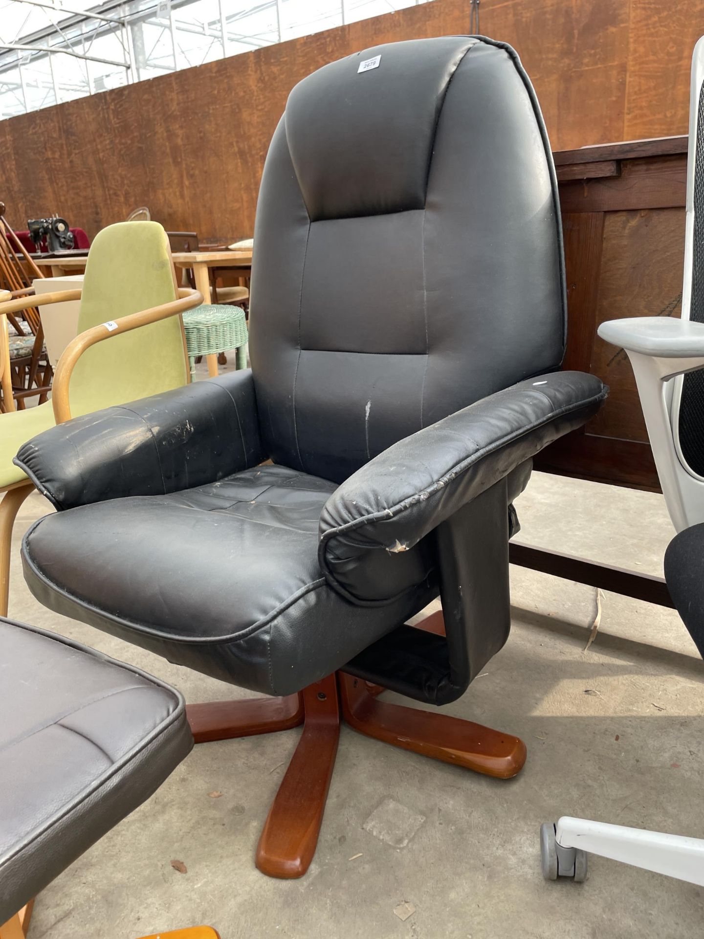 A FAUX BLACK LEATHER SWIVEL RECLINING CHAIR AND STOOL - Image 2 of 3