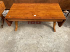 A YEW WOOD AND CROSS BANDED DROP LEAF COFFEE TABLE