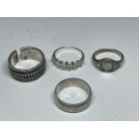 FOUR VARIOUS SILVER RINGS