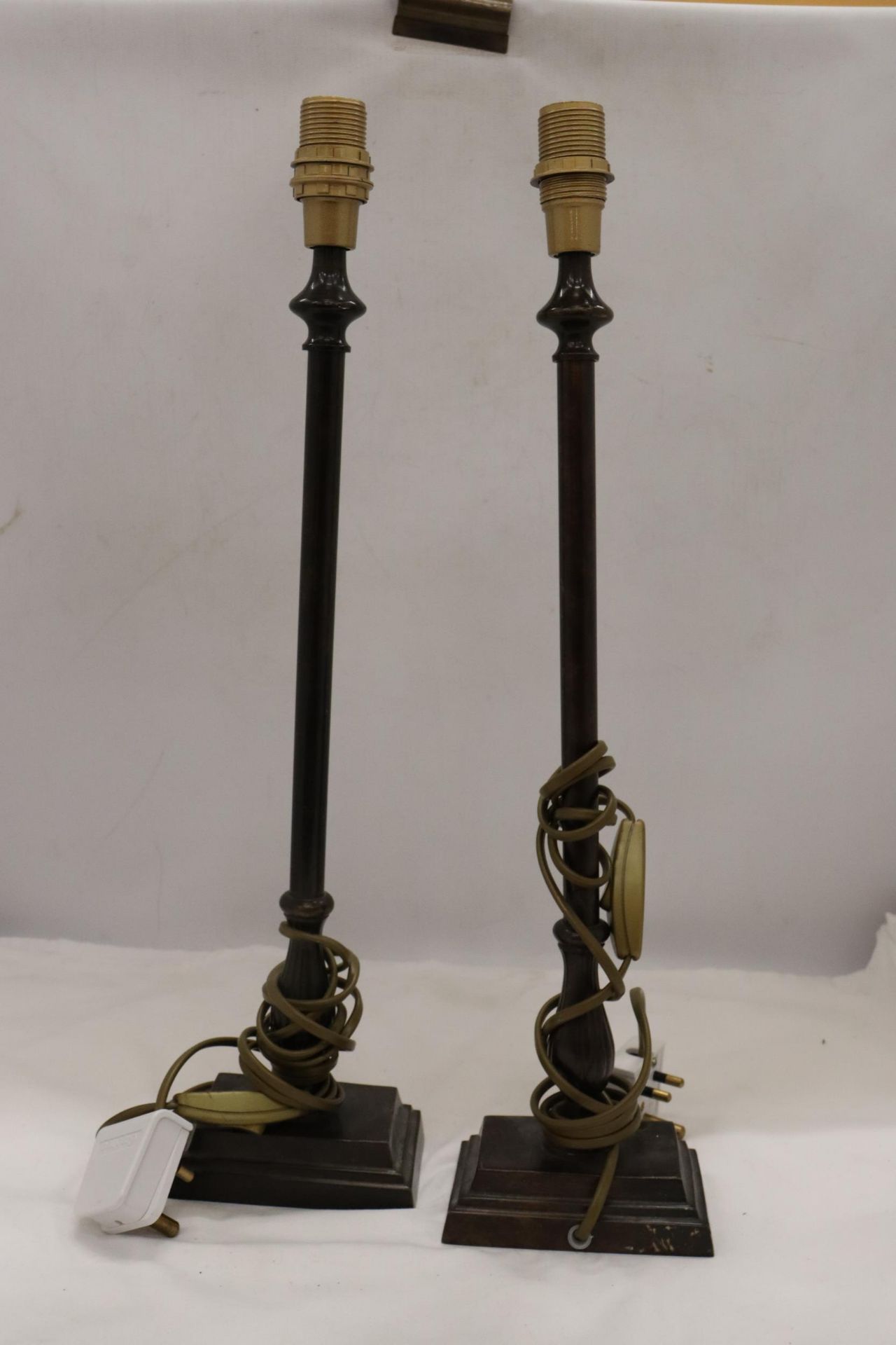 TWO BRONZE EFFECT LAMP BASES