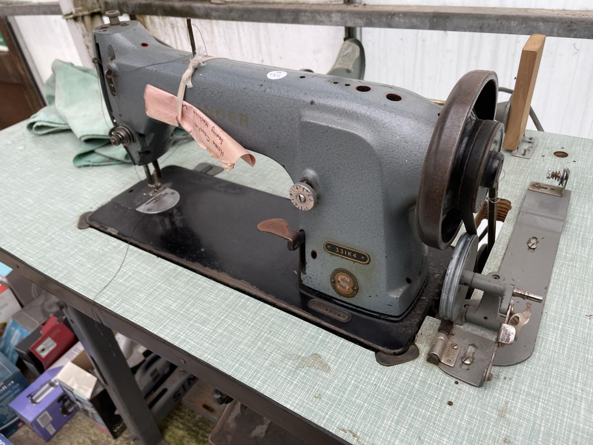 A VINTAGE SINGER INDUSTRIAL SEWING MACHINE WITH TREADLE BASE - Image 2 of 4
