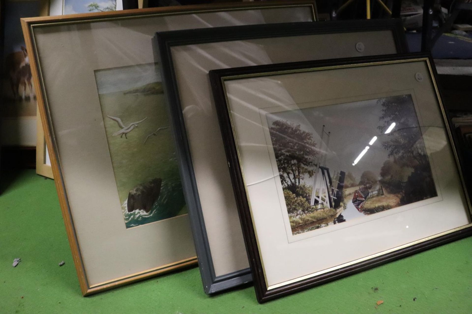 THREE SIGNED WATERCOLOURS OF COATAL AND MOUNTAIN SCENES, PLUS AN ALAN FIRTH PRINT OF A BARGING SCENE