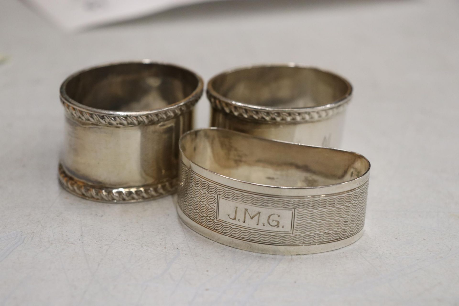 THREE HALLMARKED BIRMINGHAM SILVER NAPKIN RINGS GROSS WEIGHT 73.6 GRAMS